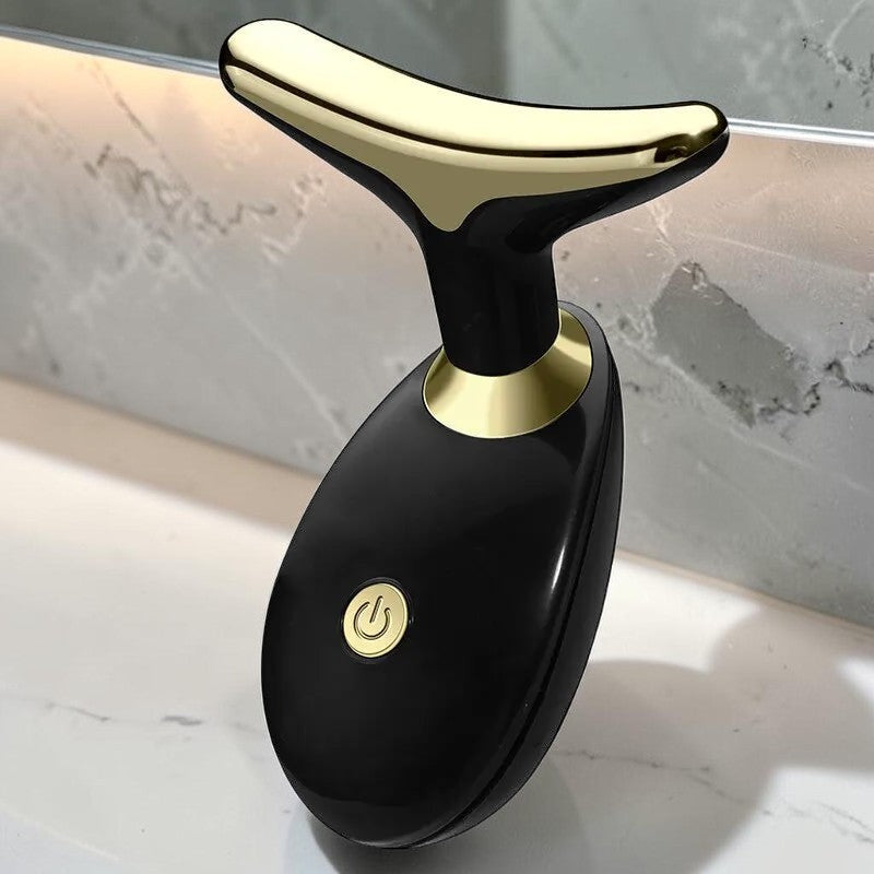 Dispositivo de masaje sónico zafiropulse PERENNE Sonic Lift en color negro y dorado para reafirmar el rostro