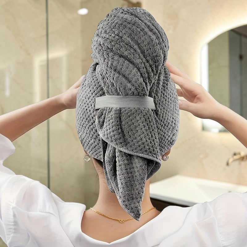 Turbante de secado de cabello zafiropulse PERENNE en color gris con textura de waffle y ajuste seguro